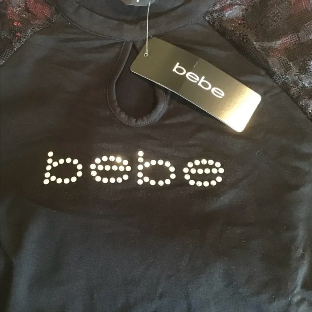 T shirt bebe. XS. Black . New with tag.